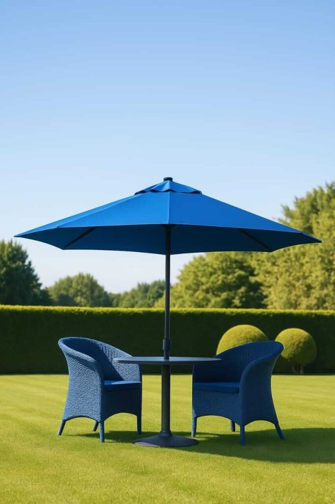 parasol-umbrella-uae Blue parasol umbrella in garden patio setup with chairs – ideal for Dubai outdoor spaces